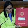 Venezuela's new leader calls for opening oil industry to foreign investment and warmer US ties