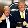 Trump signs 'Make Iran Great Again' hat alongside Lindsey Graham
