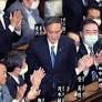 Yoshihide Suga confirmed as Japan prime minister as Abe defends 'proud' legacy