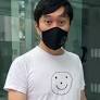 Defiant Singapore activist to plead not guilty over ‘smiley face’ protest