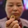 Chinese cash in jewellery at automated gold recyclers as prices soar