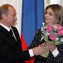 Putin's youngest son with famous gymnast named 'Vlad Jnr' pictured for first time