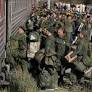 Russia offers cash bonuses, frees prisoners and lures foreigners to replenish its troops in Ukraine