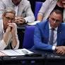 Isolated and fearing a ban, Germany's far-right tones down the rhetoric