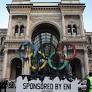 Torch arrives in Milan to cheers and protests