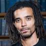 Who is Akala? Meet the British rapper with a famous musician sister who has become Angelina Jolie's rock after split from Brad Pitt - after swapping music for political activism