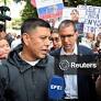 People and family members of detainees gather outside Venezuela's National Assembly