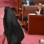 Australian far-right Senator Pauline Hanson slammed for wearing burqa to parliament to demand ban