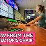 Behind-the-scenes view of director’s seat during newscast