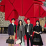 Prada blends iconic triangle and horse for New Year