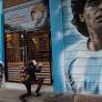 An Argentine judge orders 8 to face a homicide trial in soccer star Maradona's death