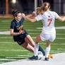 Girls soccer action in the Class 6A, District 6 tournament
