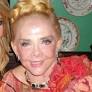 Millionaire socialite escapes former driver who 'locked her up for a year'