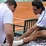 Djokovic through after Lapentti pulls out