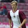 Football - McInnes signs Arvydas Novikovas on loan as two depart