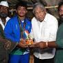 Minister Chandrakant Patil Announces Guardianship of Gold Winning Wrestler Sunny Fulmali