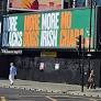 London billboard appears in support of Kneecap ahead of band member appearing in court on terror charge