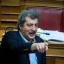 In COVID-19 Hospital Visit, SYRIZA MP Polakis Refuses to Wear Mask