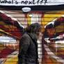 Greek parliament approves bailout measures as Syriza fragments