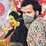Gold mask for goddess at Baguiati khuti puja