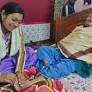 Female TMC member gives foot massage to MLA Asit Majumder