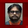 Bloomington man charged with stealing up to $500K from local language school