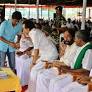 Furious DMK cadre fast in districts headquarters over House furore