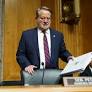 Peters presses Mullin to explain past comments: ‘Where did you smell war?’