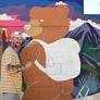 Altadena mural on wall of rebuilt home connects residents back to era of rails and trails