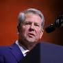 Collins: Kemp holding Dooley’s hand on campaign trail