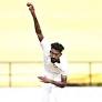 Vidarbha's Praful Hinge bends his back