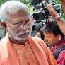 Who is Swami Aseemanand?