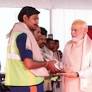 PM Modi felicitates workers involved in making of new Parliament House