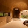 Inside a 1,450-square-foot cave-like, climate-responsive farmhouse in Coimbatore