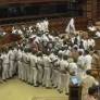 Three opposition MLAs suspended from Kerala assembly for attacking Chief Marshall