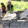 Volunteers work to clean up blighted historic Black cemetery