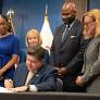 Pritzker signs nearly $56B budget with new business taxes as he seeks 3rd term
